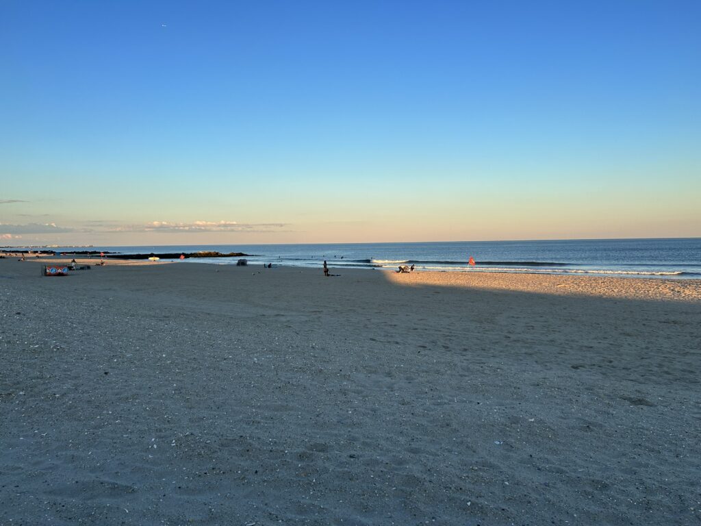 a beach with people on it (MyCoast AI)