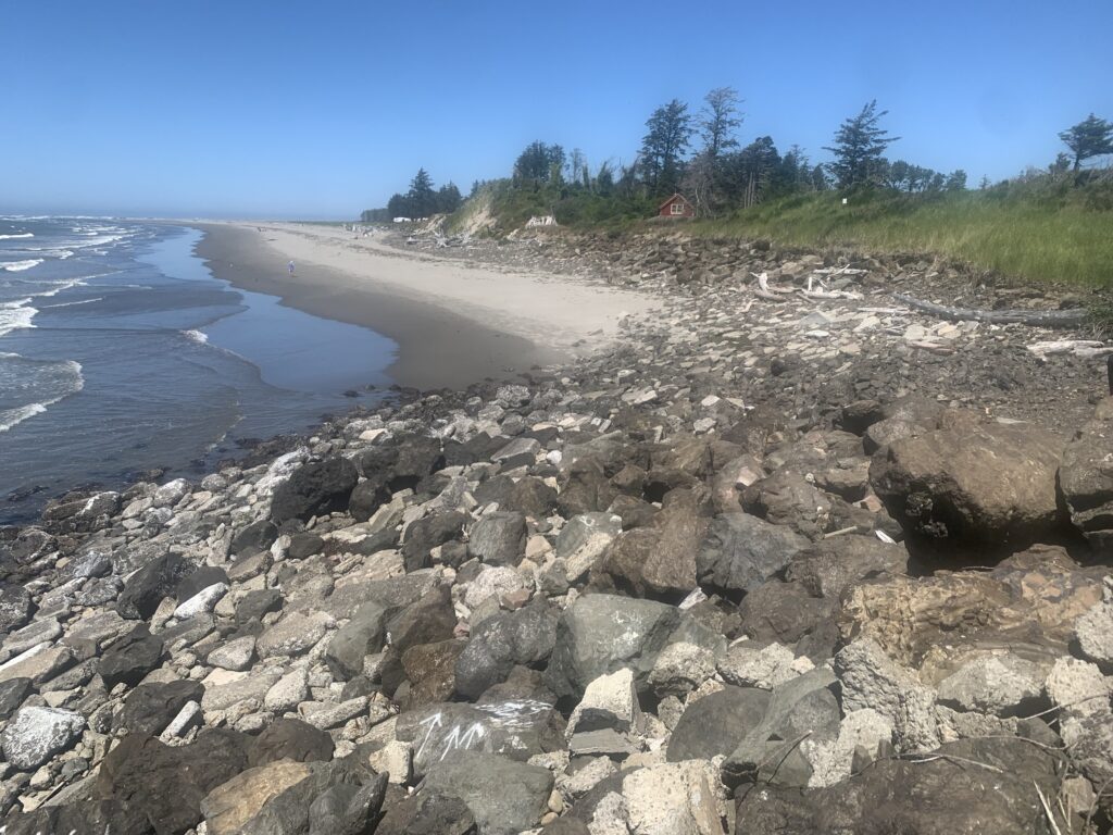 a rocky beach with a sandy beach (MyCoast AI)