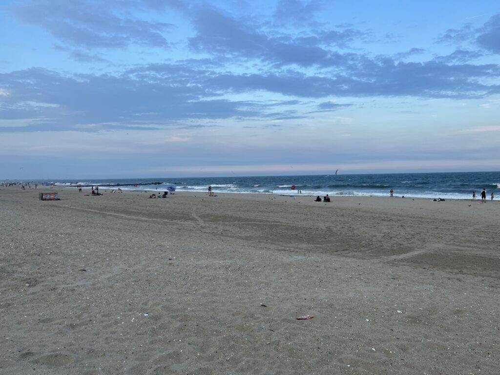a beach with people on it (MyCoast AI)