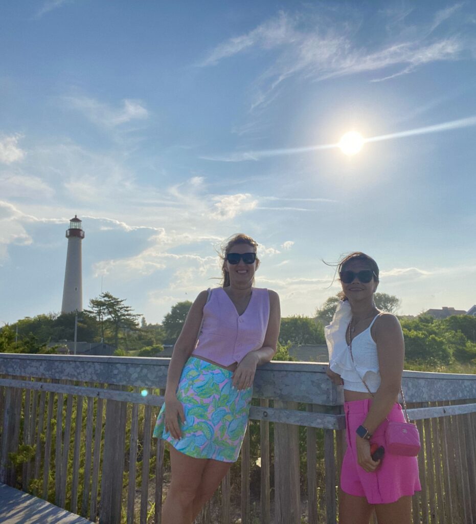 two women standing on a bridge (MyCoast AI)