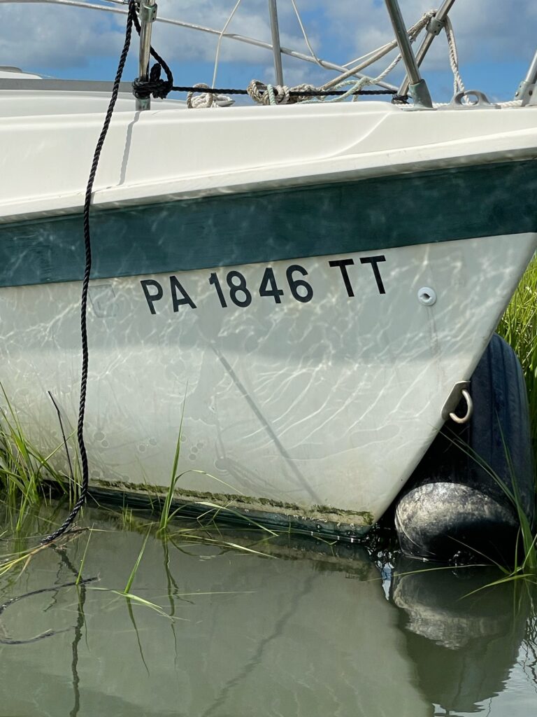 a boat sits in the water (MyCoast AI)