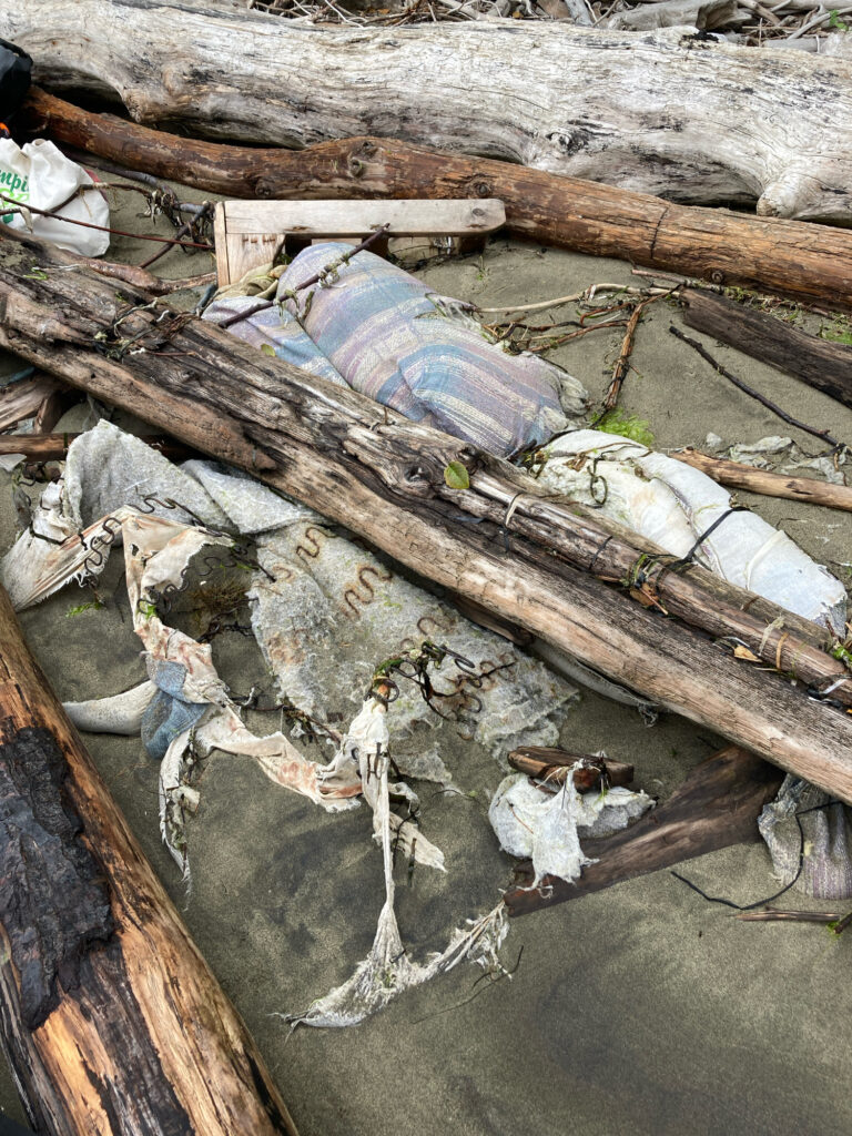 a pile of wood and debris (MyCoast AI)
