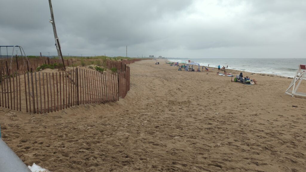 a sandy beach with people on it (MyCoast AI)