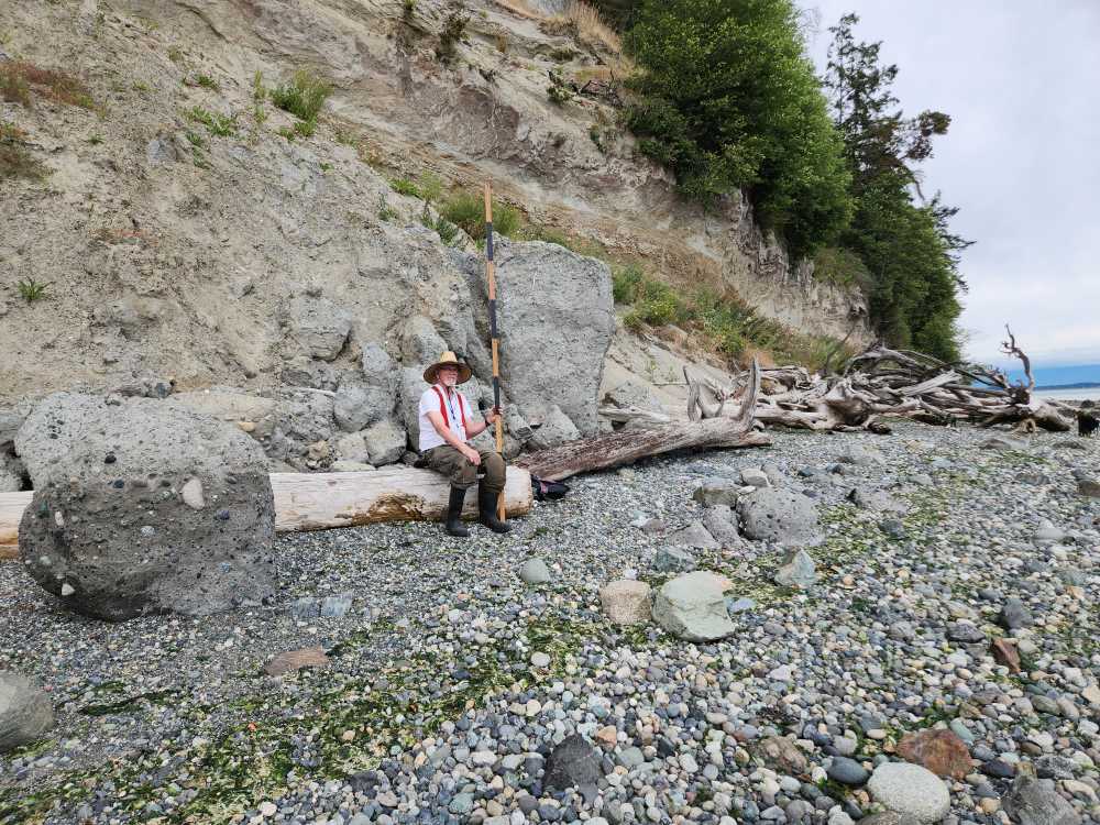 a person sitting on a log (MyCoast AI)