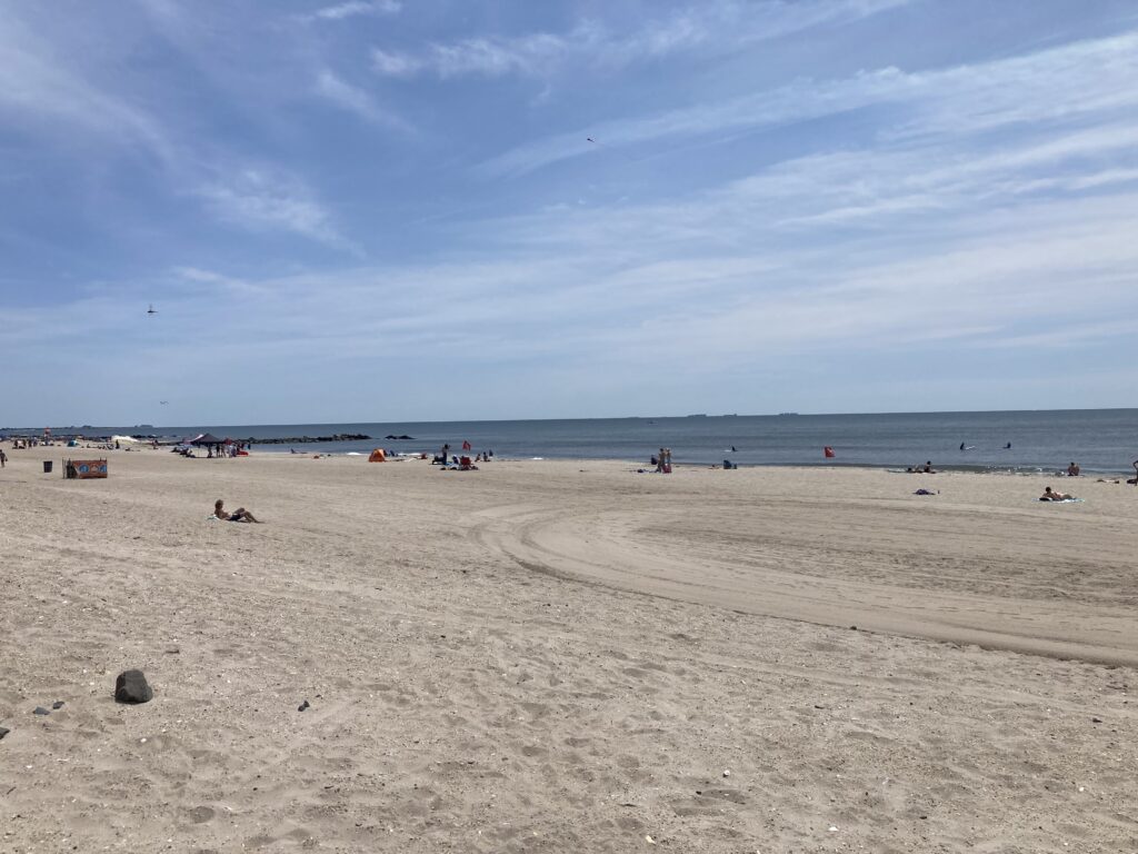 a beach with people on it (MyCoast AI)