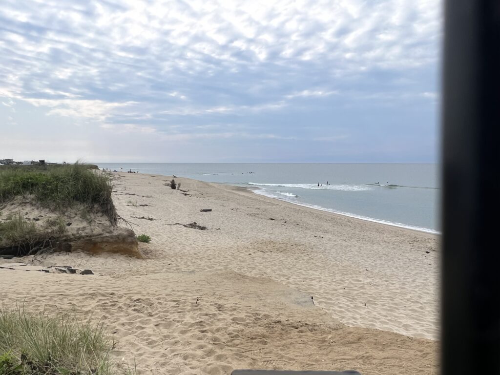 a sandy beach with people on it (MyCoast AI)