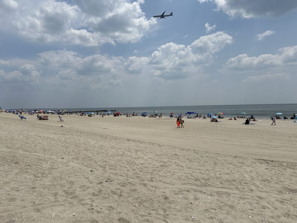 a group of people at the beach (MyCoast AI)