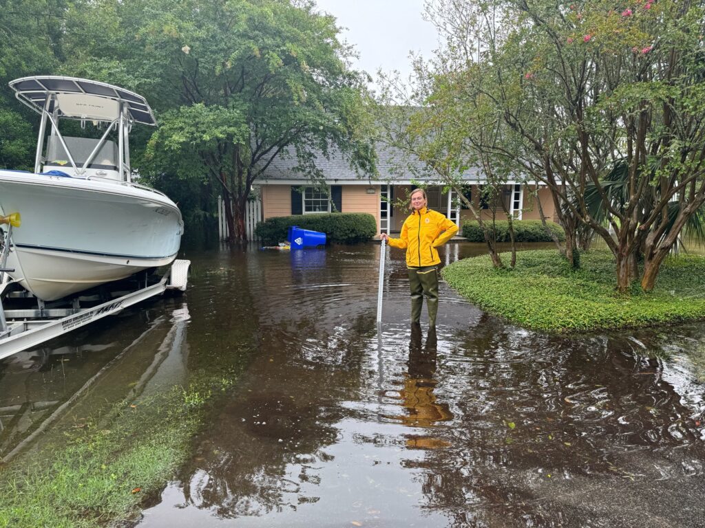 a person standing in a flooded area (MyCoast AI)
