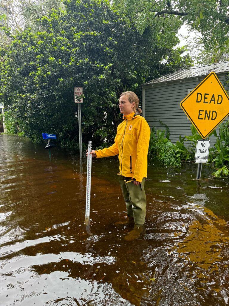 a man standing in a flooded street (MyCoast AI)