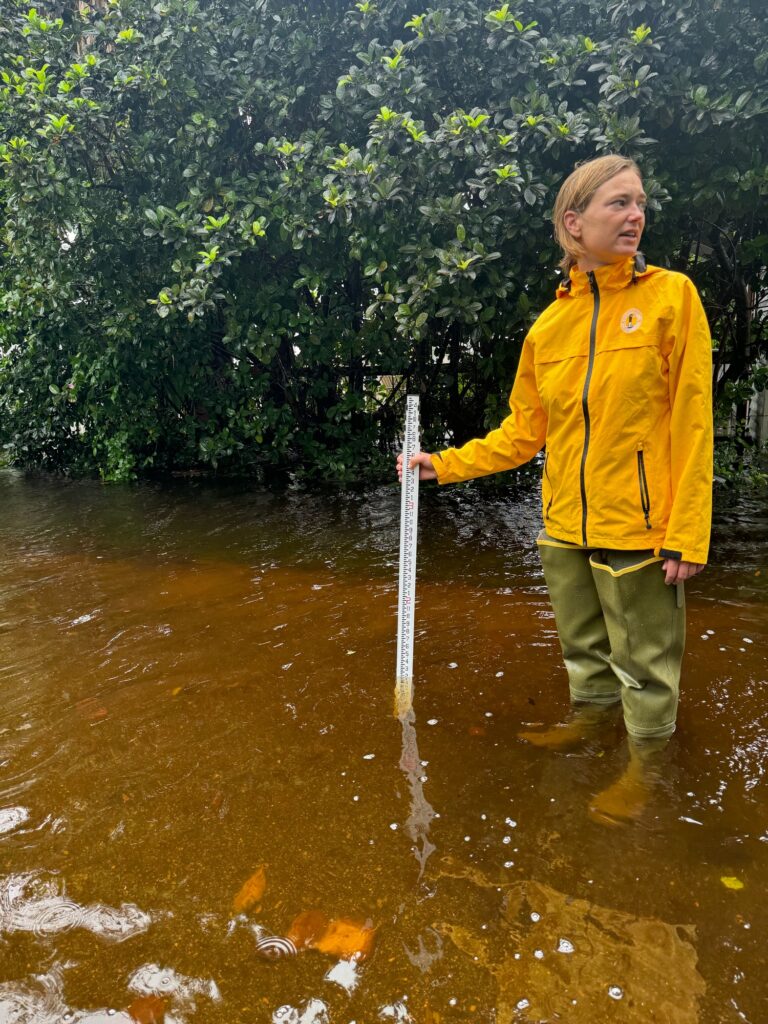 a man standing in a puddle (MyCoast AI)