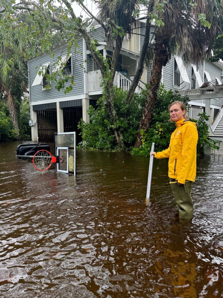 a man standing in a flooded street (MyCoast AI)