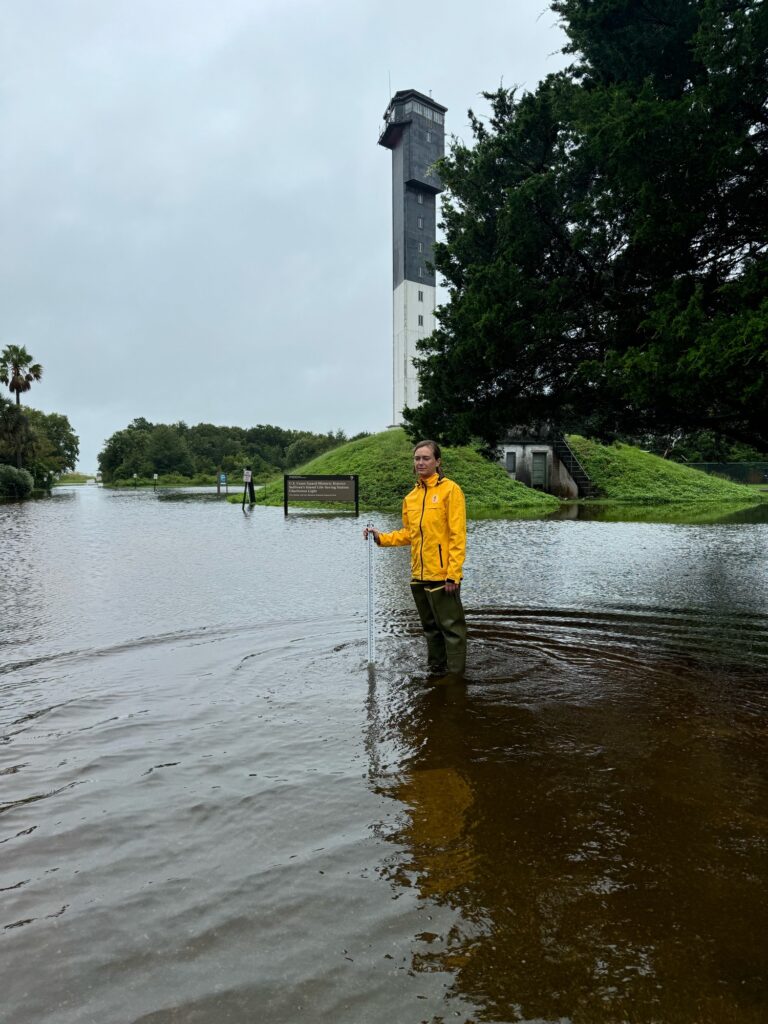 a man standing in a flooded area (MyCoast AI)