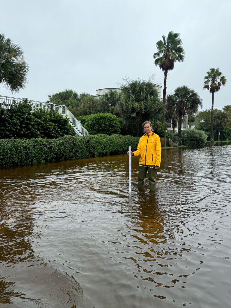 a person standing in a flooded area (MyCoast AI)