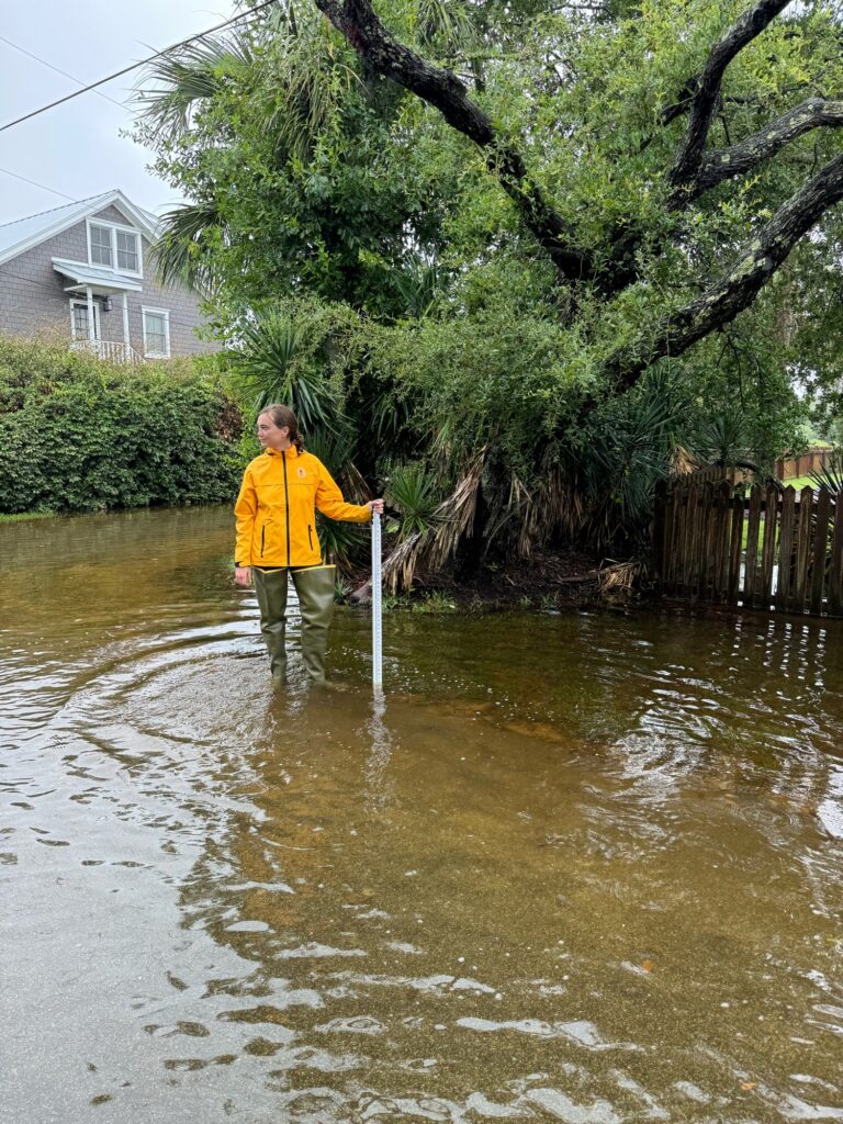 a man standing in a flooded area (MyCoast AI)