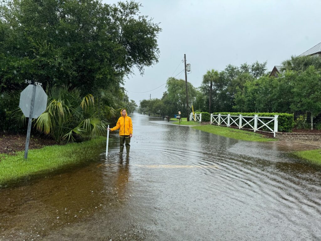 a person walking in a flooded street (MyCoast AI)