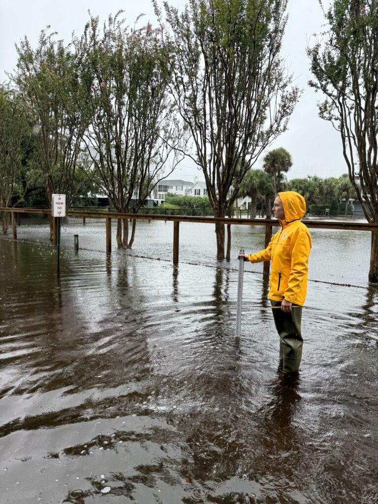 a person standing in a flooded area (MyCoast AI)