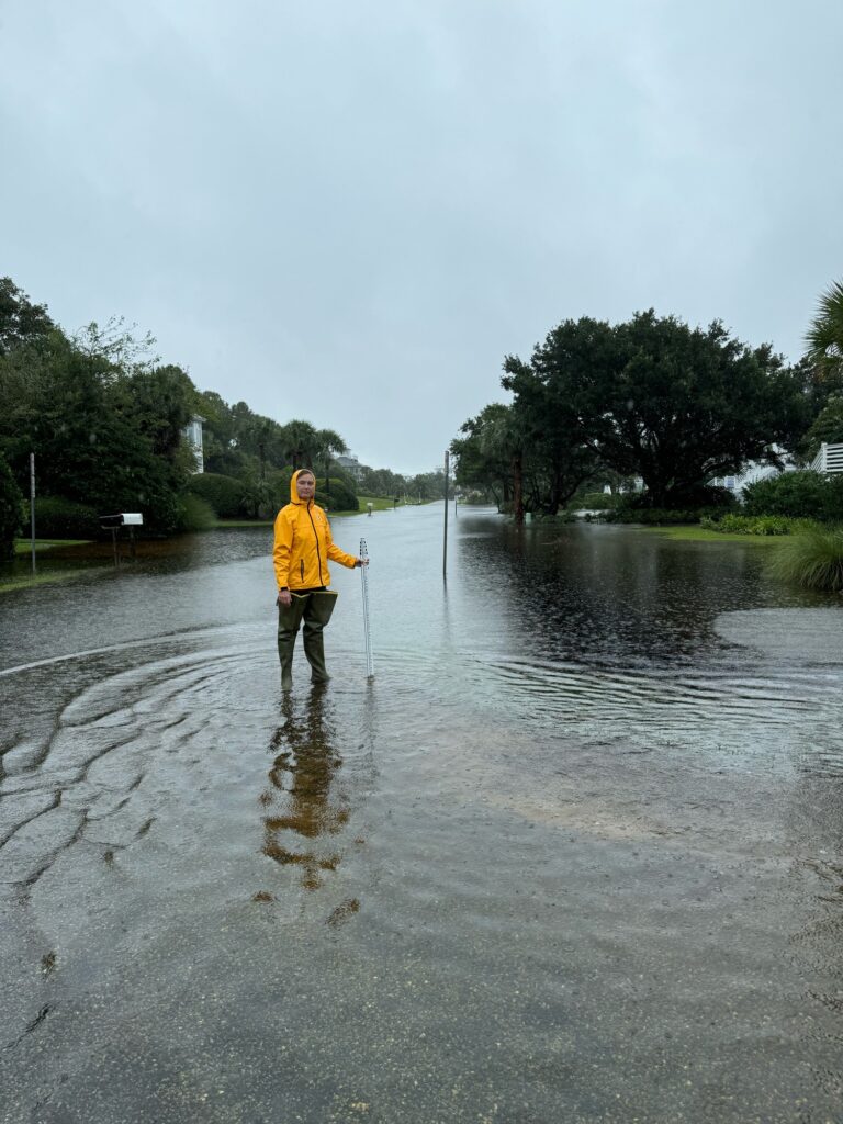 a man standing in a puddle (MyCoast AI)