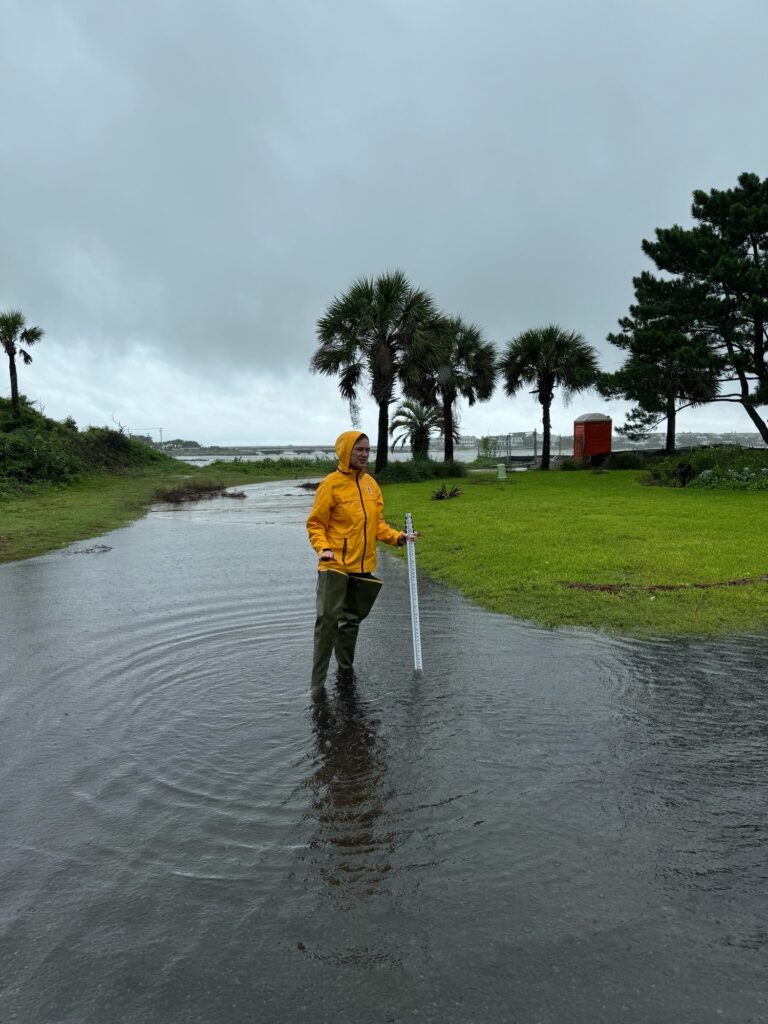 a man standing in a flooded area (MyCoast AI)