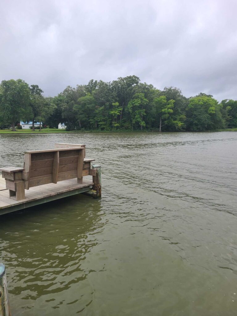 a wooden dock in a lake (MyCoast AI)