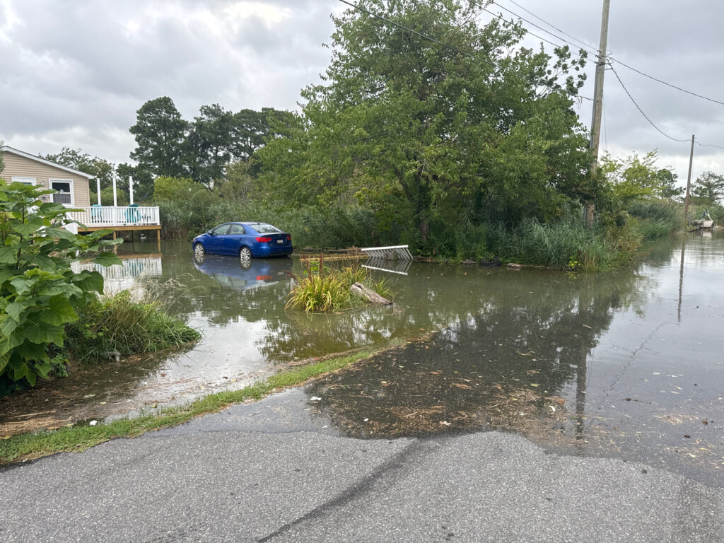 a car parked in a flooded street (MyCoast AI)
