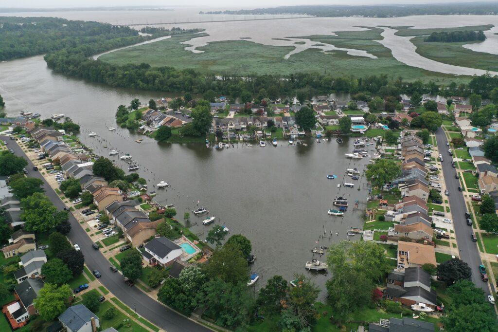 a body of water with boats in it and buildings around it (MyCoast AI)