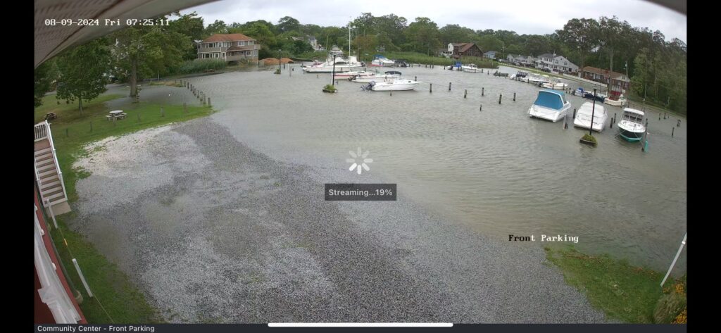 a body of water with boats in it and buildings around it (MyCoast AI)