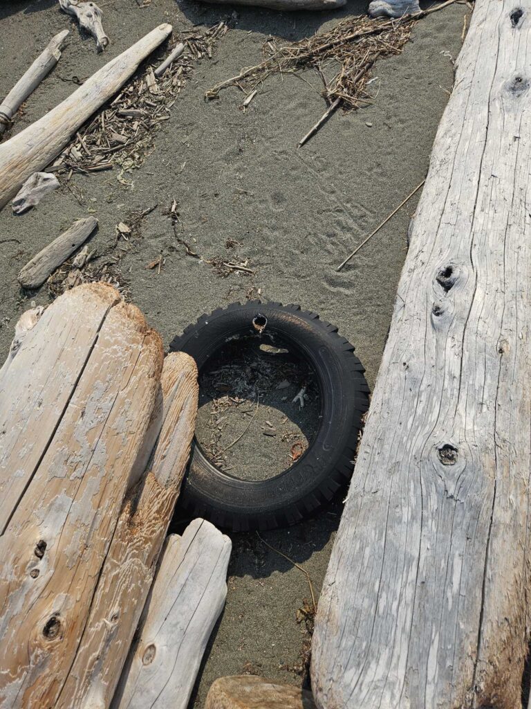a tire on the ground (MyCoast AI)