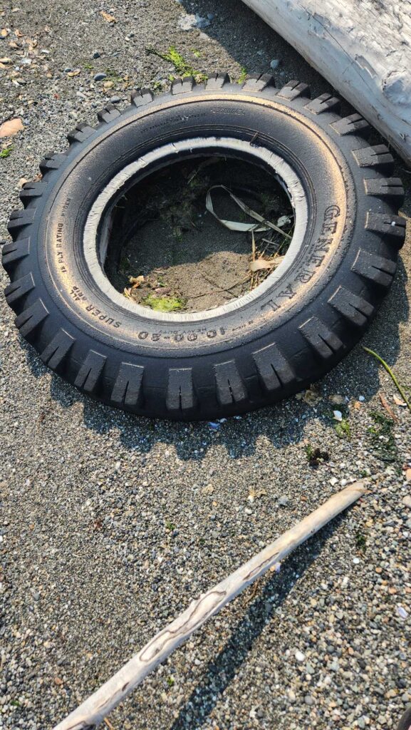 a tire on the ground (MyCoast AI)