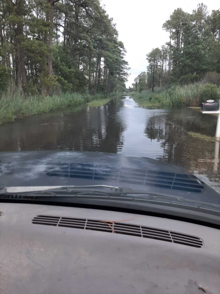a car on a flooded road (MyCoast AI)