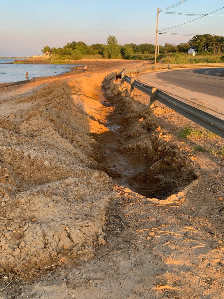 a road with water on the side (MyCoast AI)