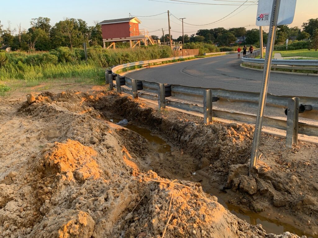 a road with water on the side (MyCoast AI)