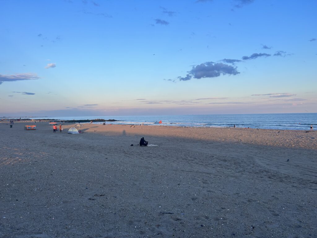 a person sitting on a beach (MyCoast AI)