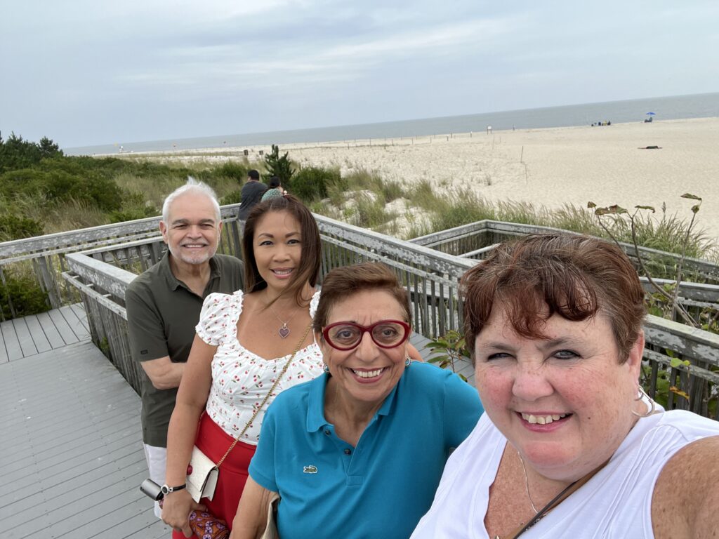 a group of people posing for a photo (MyCoast AI)