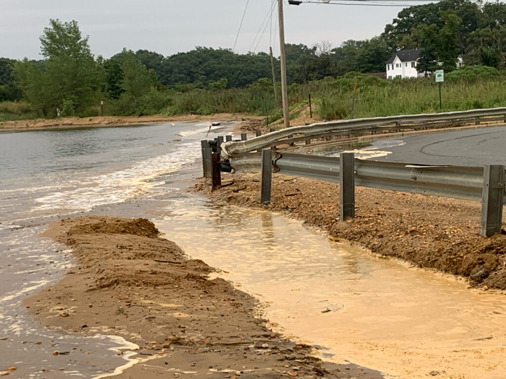 a flooded area with a wooden bridge (MyCoast AI)