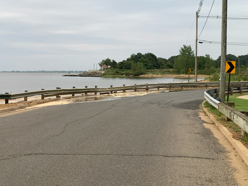 a road next to a body of water (MyCoast AI)