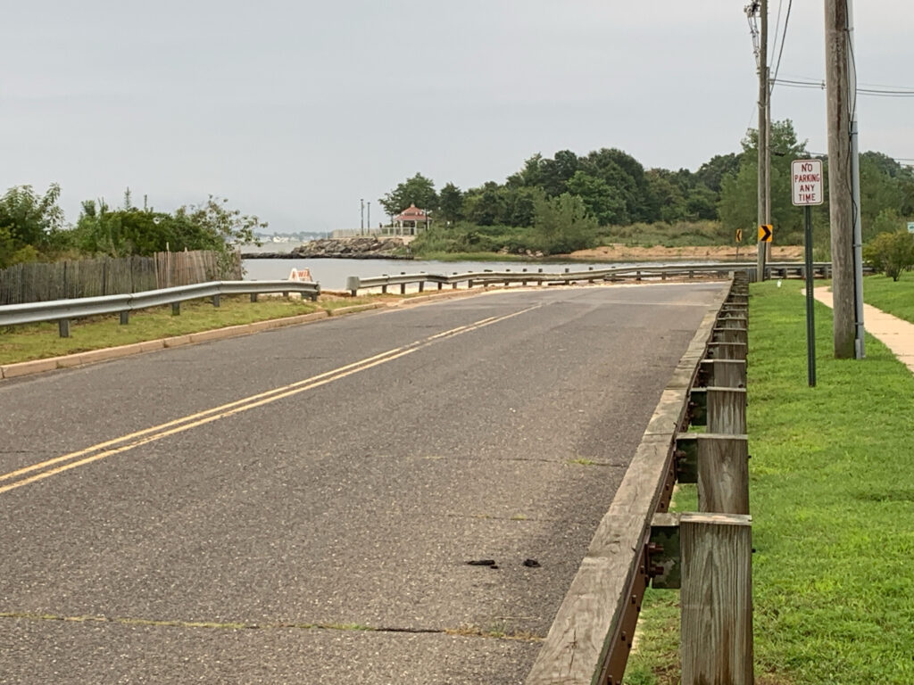 a road with a bridge over it (MyCoast AI)