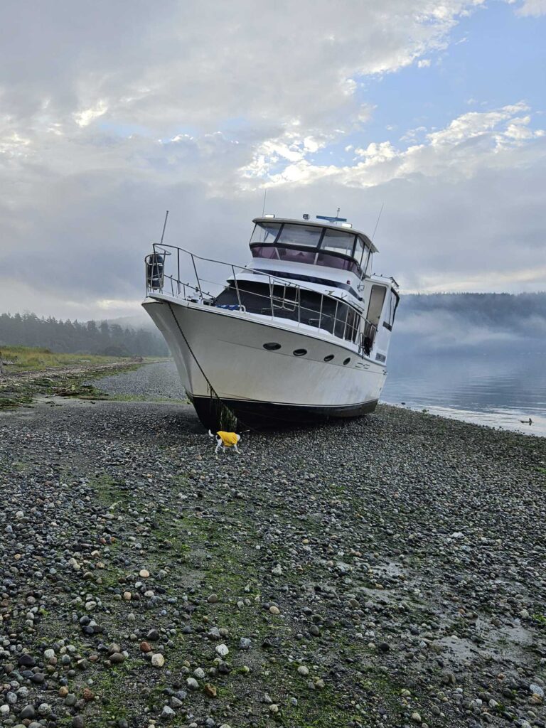 a boat on a rocky beach (MyCoast AI)
