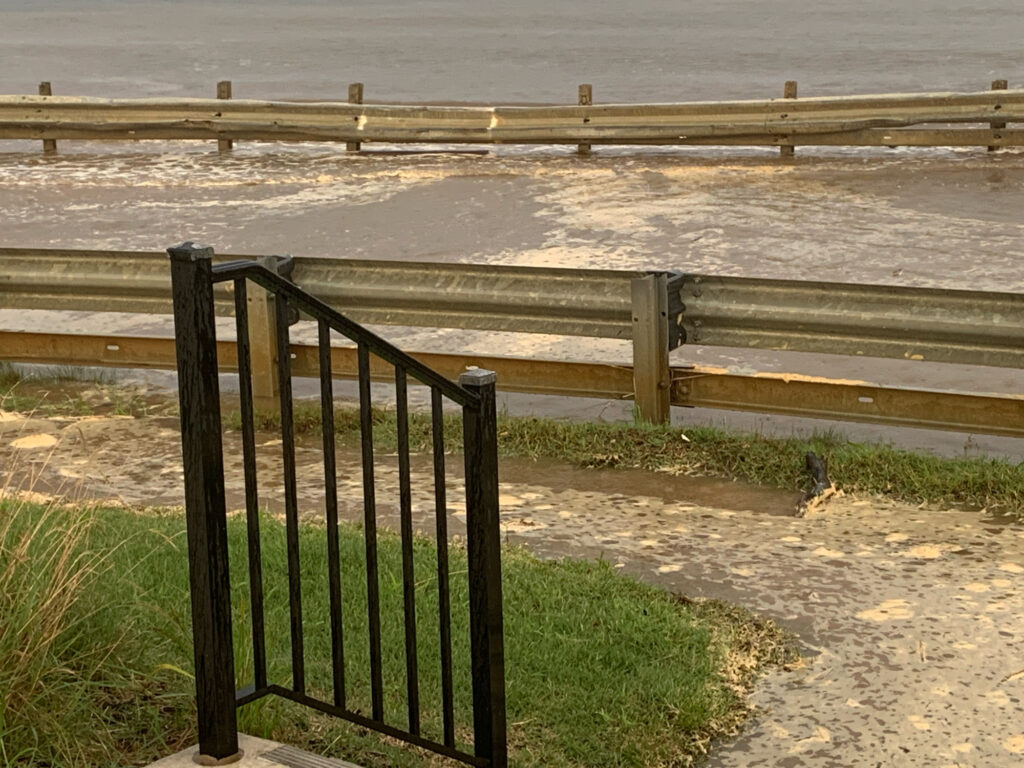a wooden gate on a beach (MyCoast AI)