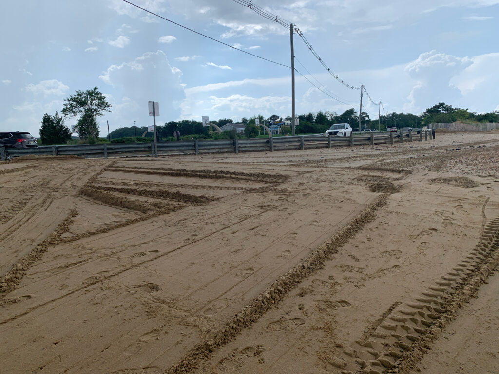 a dirt road with cars on it (MyCoast AI)