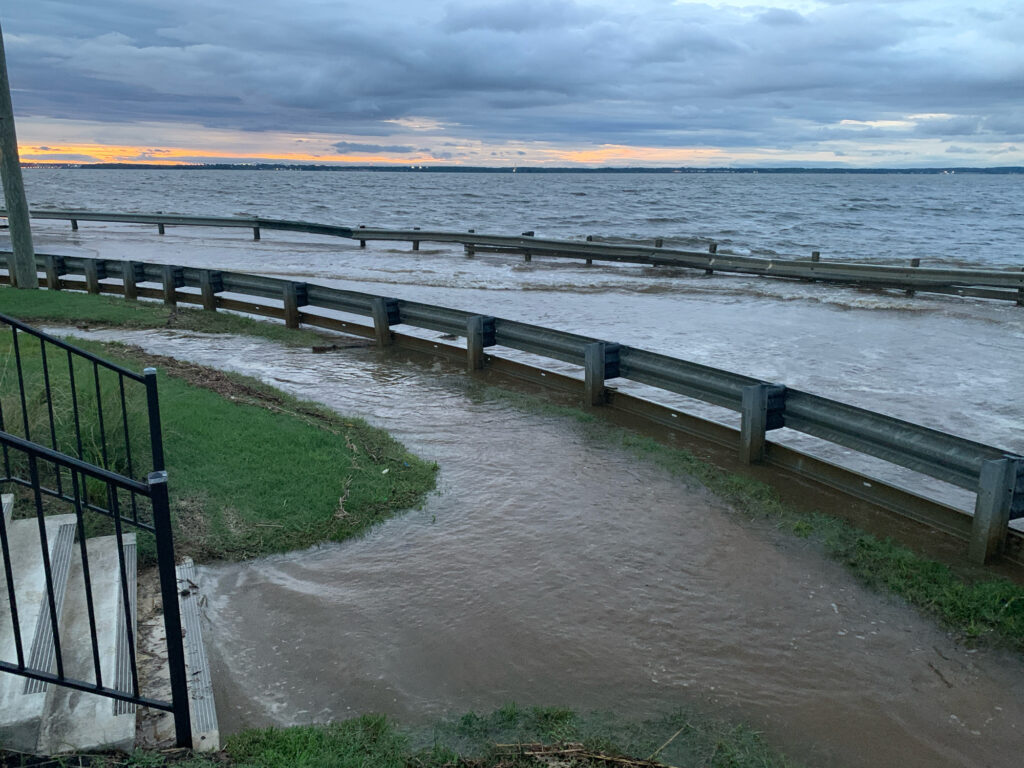 a wooden walkway over a body of water (MyCoast AI)