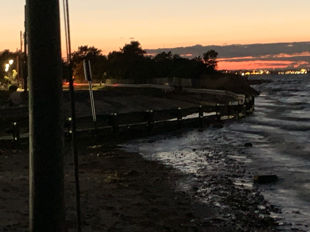 a sunset over a beach (MyCoast AI)