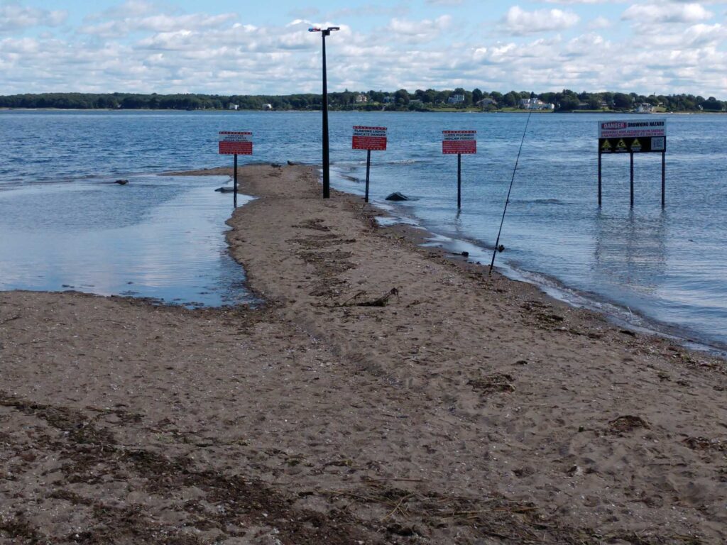 a beach with signs (MyCoast AI)