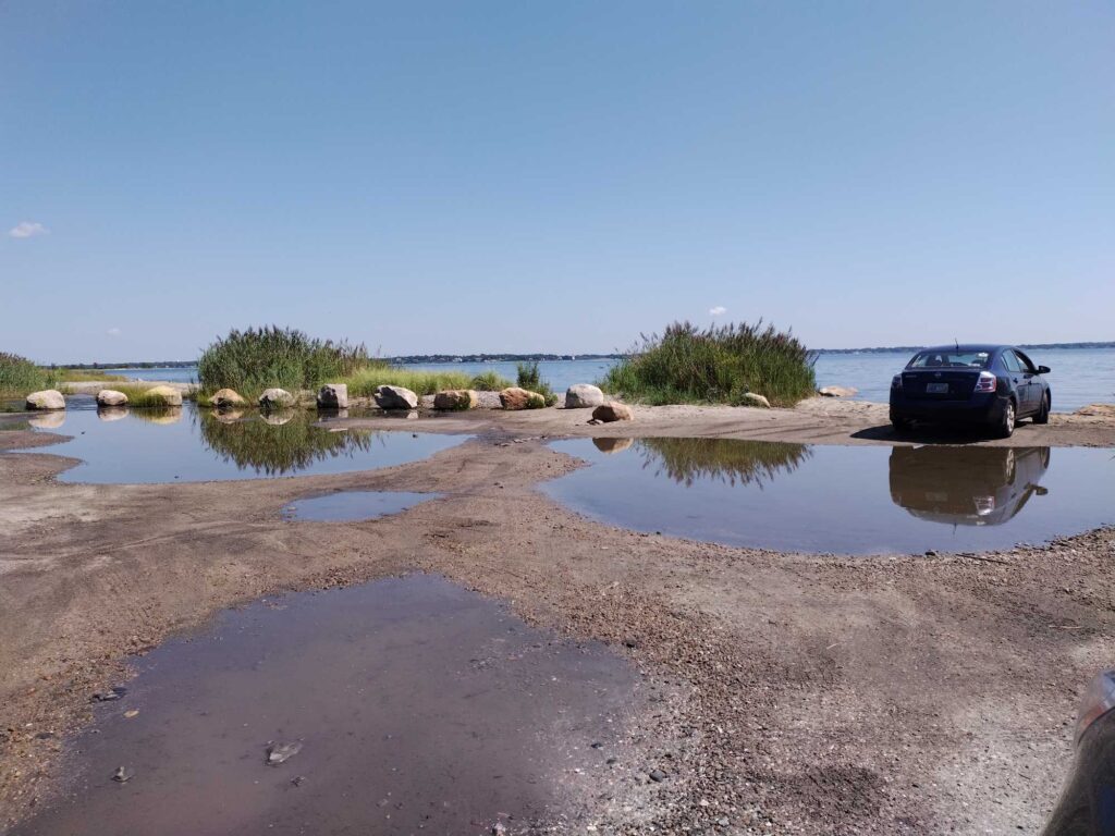 a car parked on a beach (MyCoast AI)