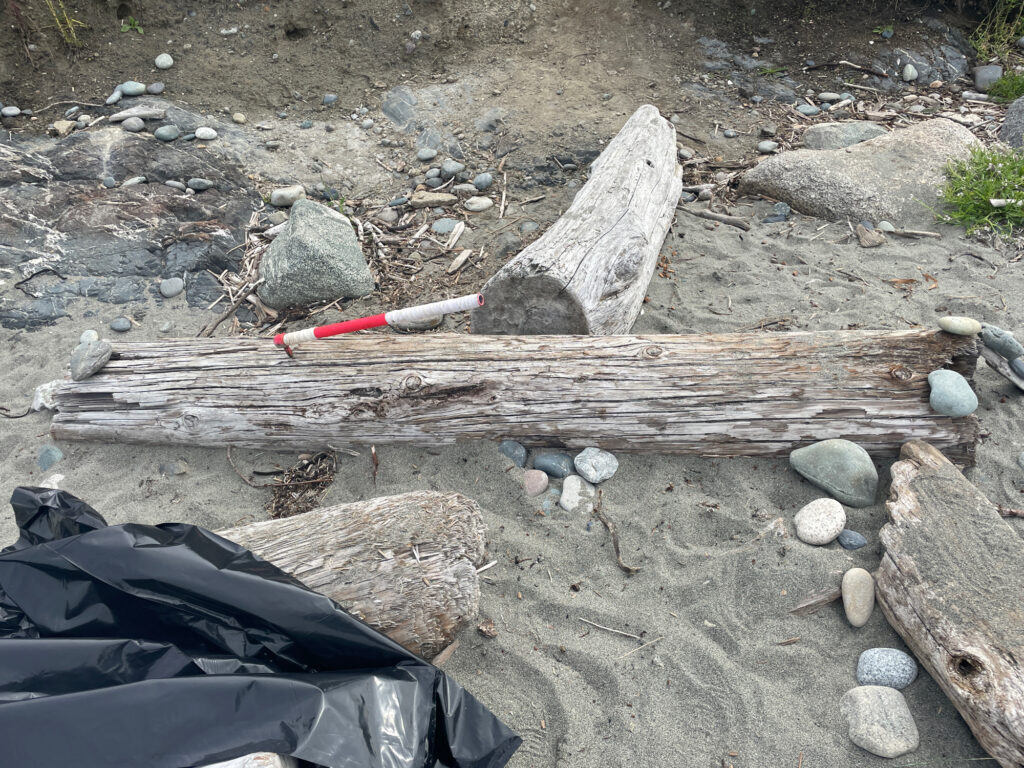 a wood bench in a rocky area (MyCoast AI)