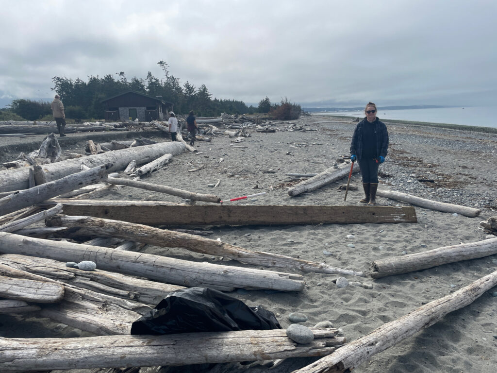a man standing on a beach (MyCoast AI)