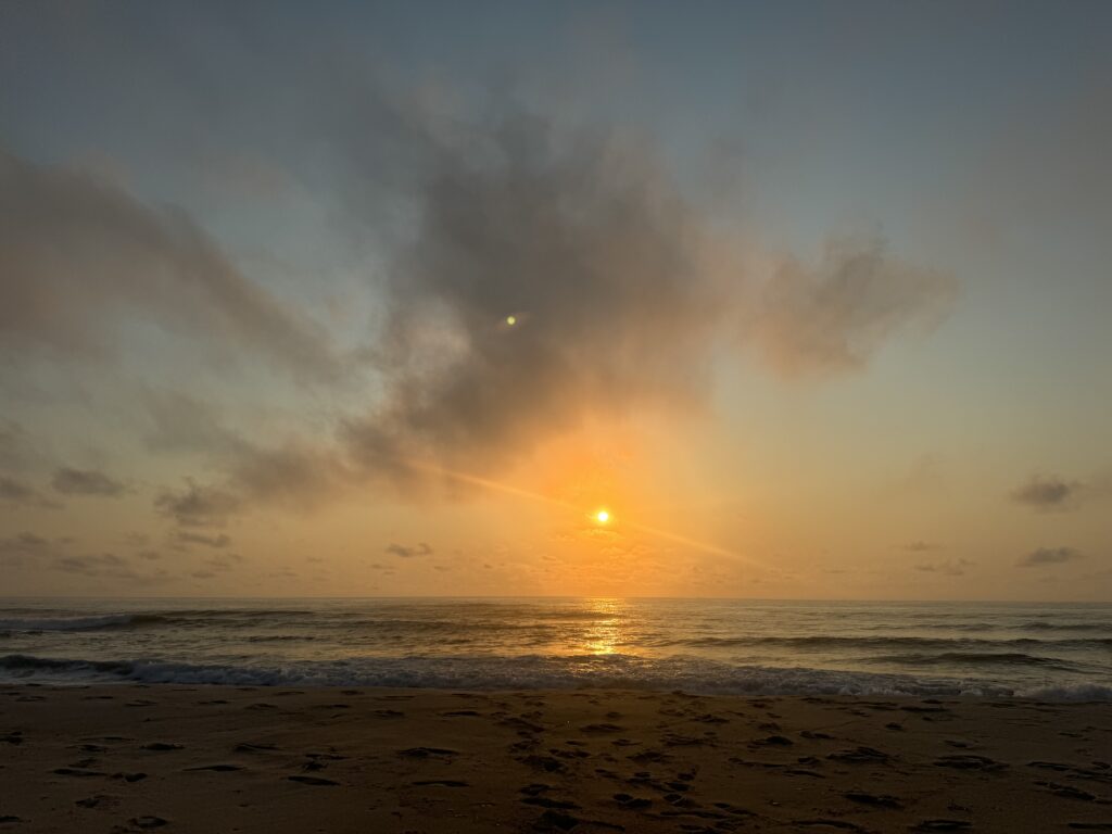 a beach with a sunset (MyCoast AI)