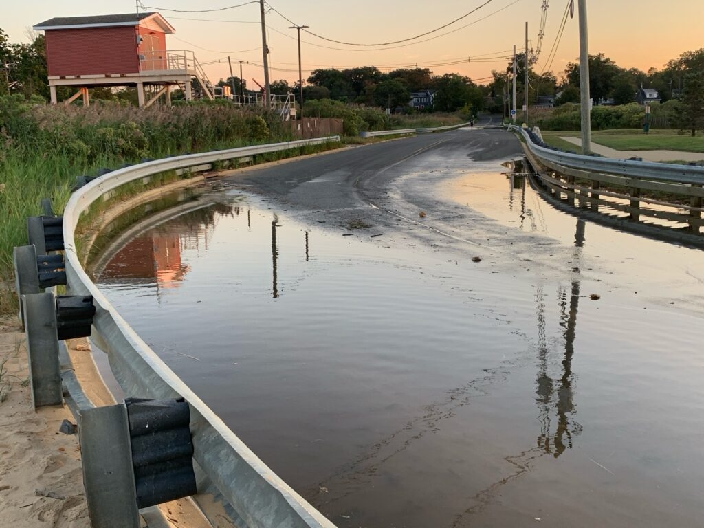 a flooded road with a bridge (MyCoast AI)