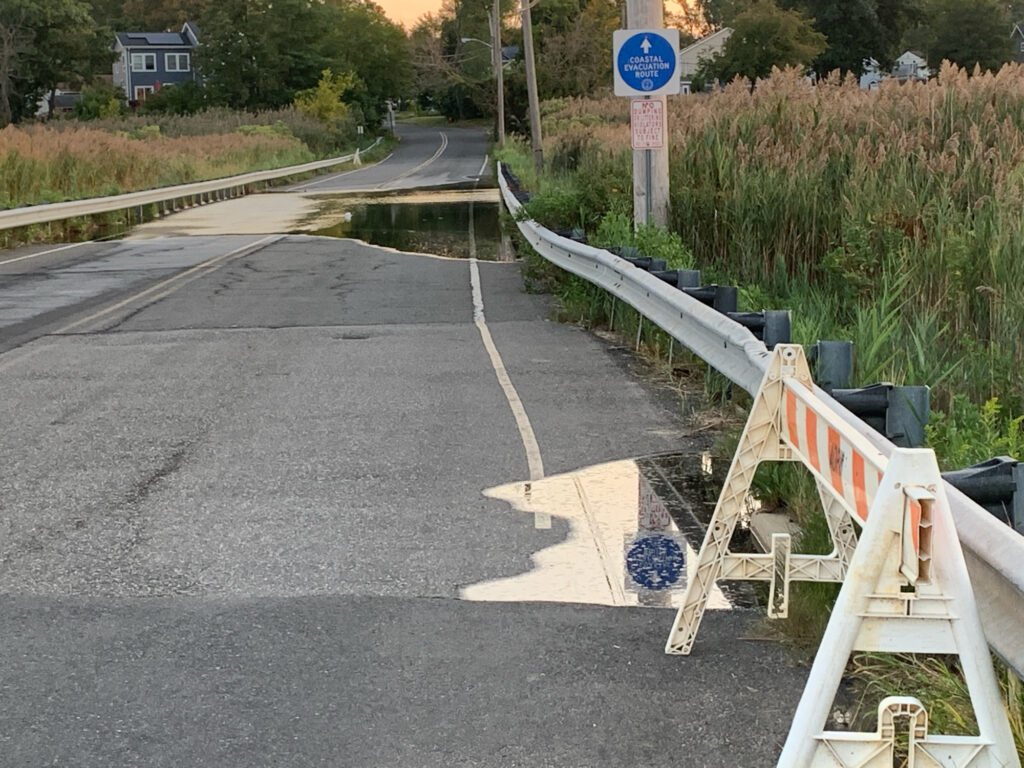 a road with a sign on it (MyCoast AI)