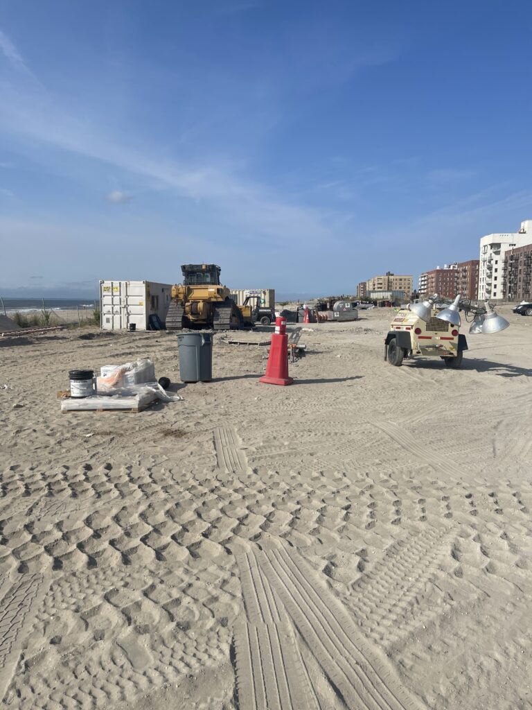construction site with a truck and a tractor (MyCoast AI)