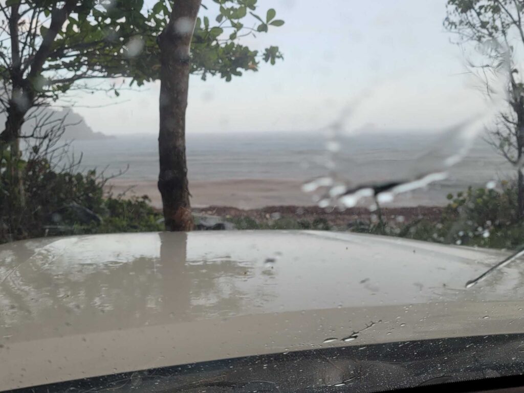 a view of a beach from a window (MyCoast AI)